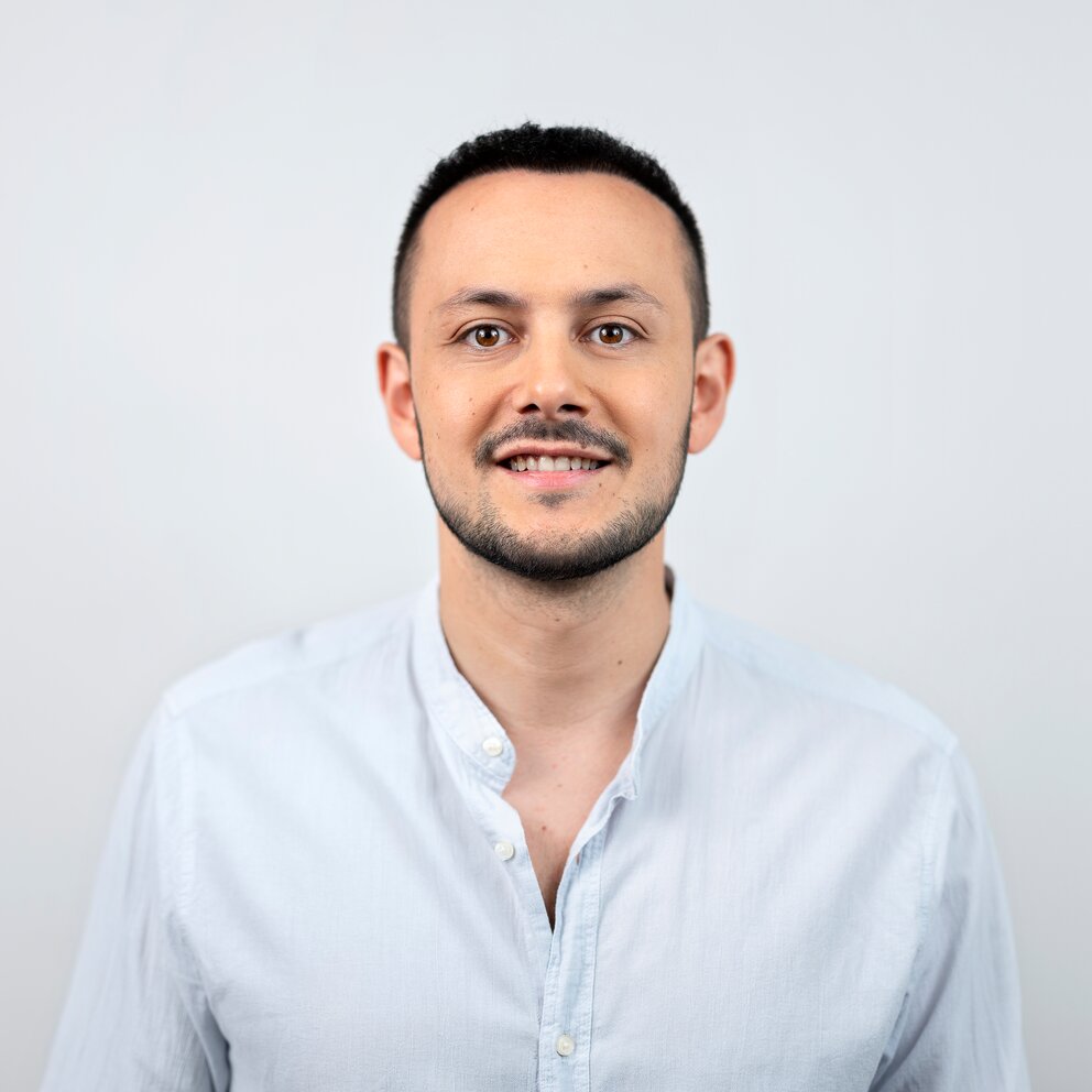 Portraitfoto karim Menn